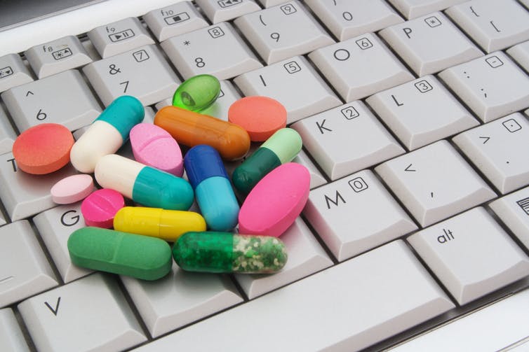 Image of drugs on a keyboard